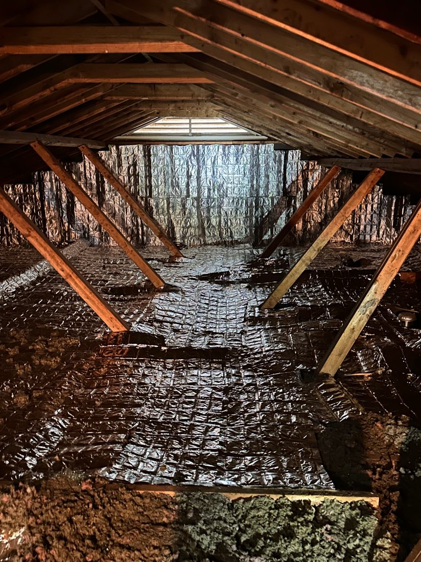 EnigMAT covering the floor and gable walls of a residential attic